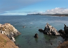 Fog dissipates to reveal the north view: Cape Foulweather and Beverly Beach.
